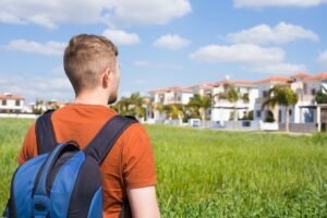 Man looking at a beautiful house to buy